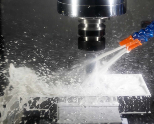 CLose up view of a water jet cleaning a machine