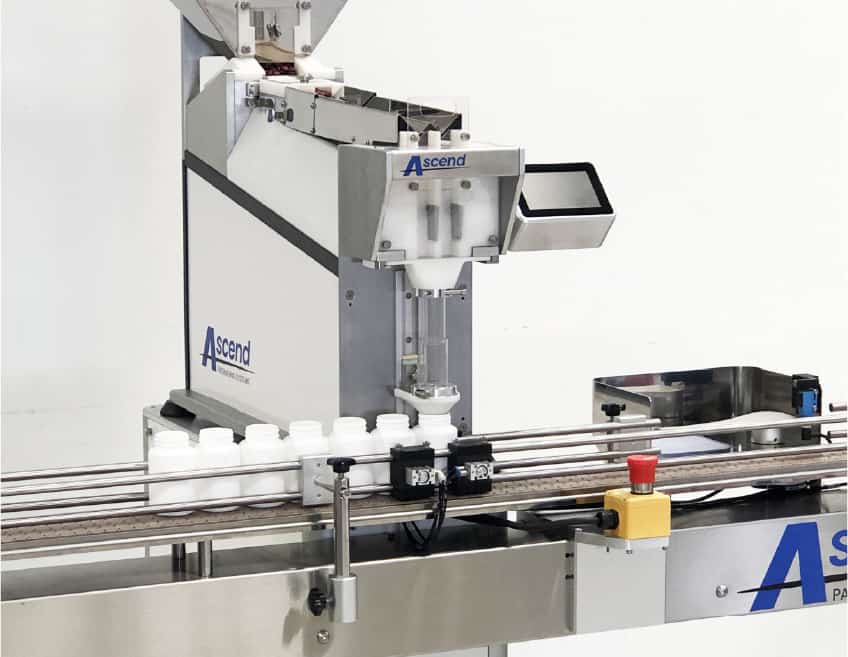image of the tomcat 1210 a bottle filling and counting machine